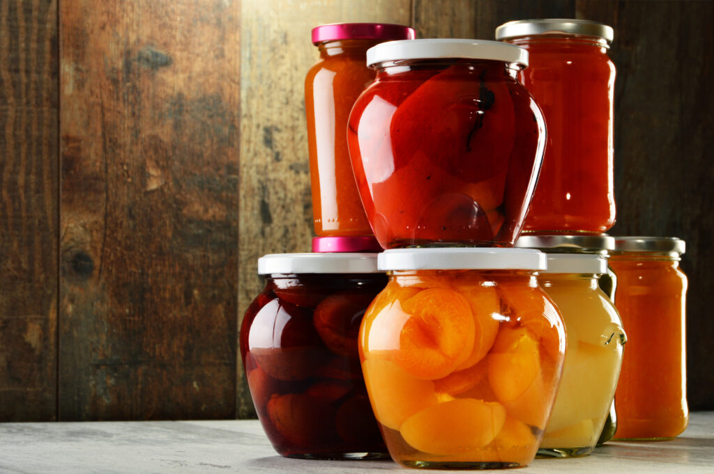 Jars,With,Pickled,Vegetables,,Fruity,Compotes,And,Jams,In,Cellar.